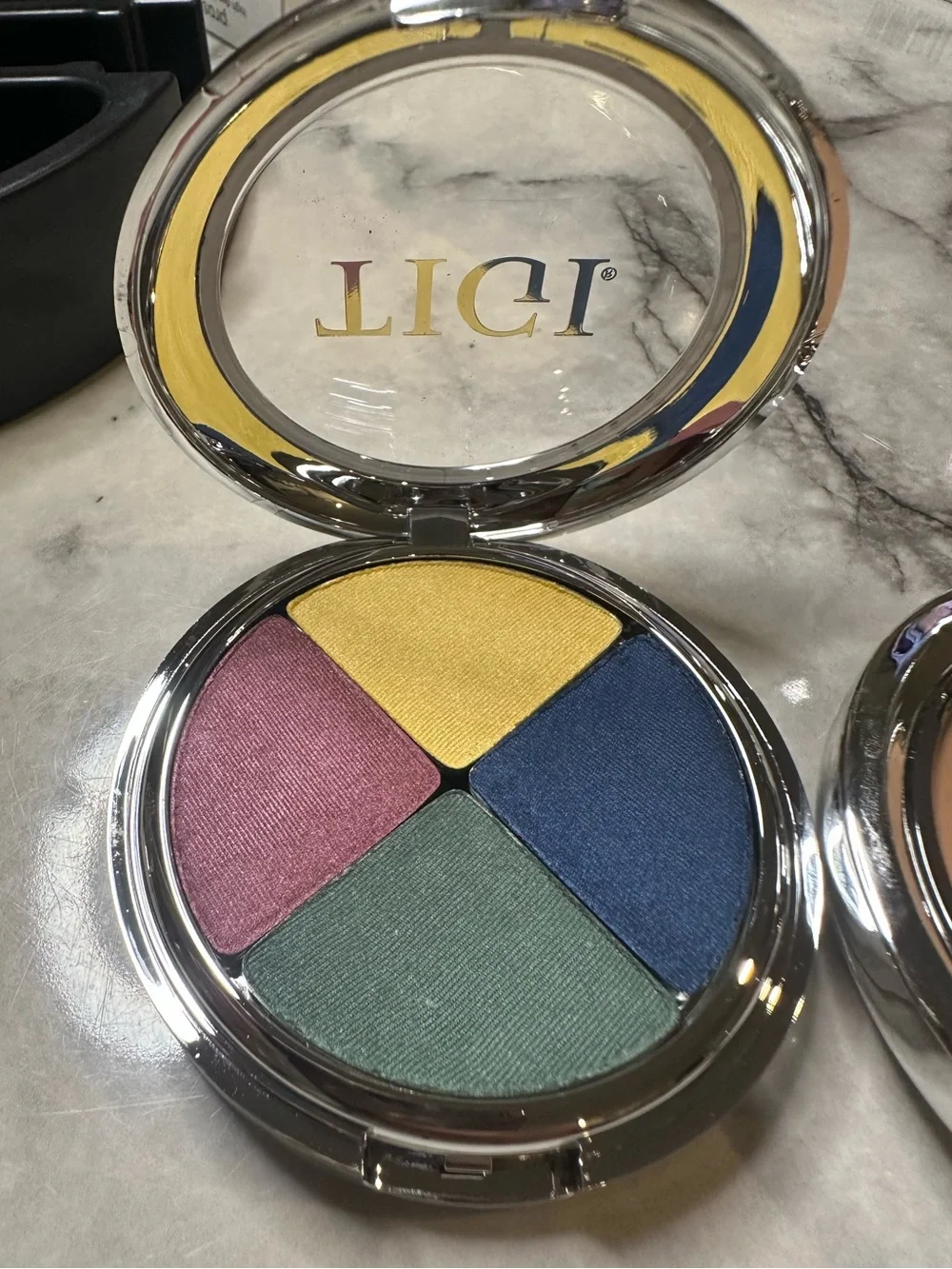 TIGI Quad Eyeshadow Palette, 3 eyeliners, 1 lip liner